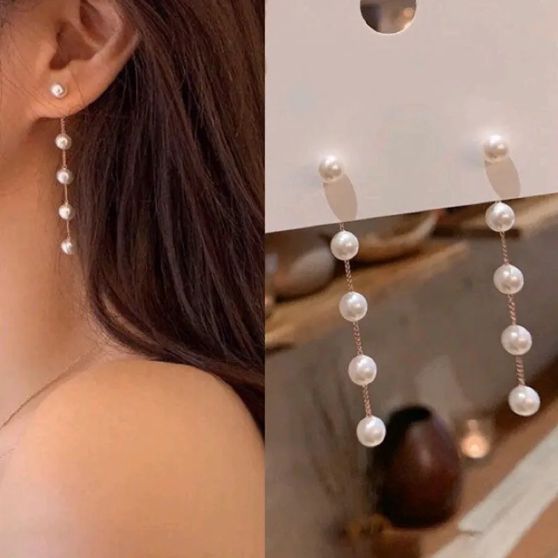 Aretes largos con perlas