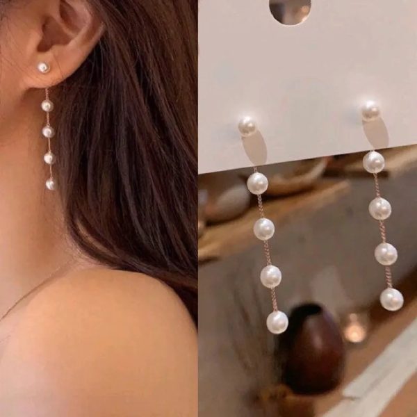 Aretes largos con perlas