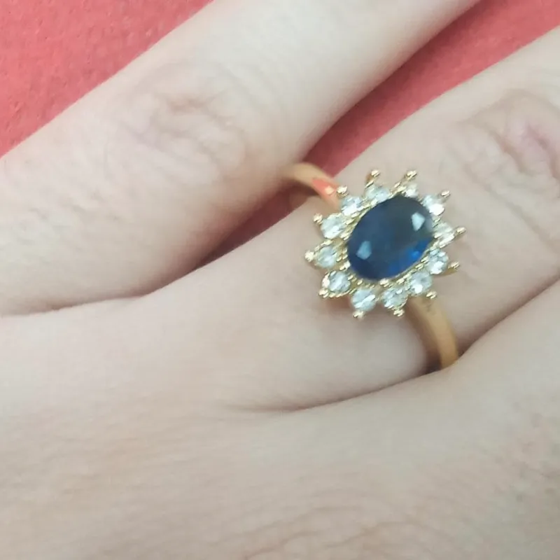 Cod-A 053 Anillo Dorado  piedra Azul