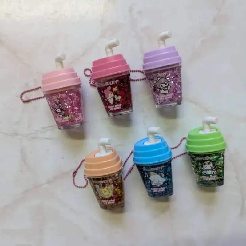 Brillos de labios en forma de vaso