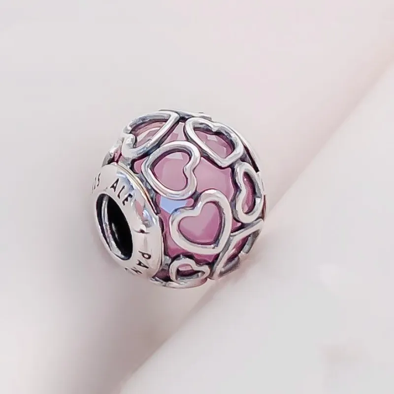 Charm corazones cristal rosa