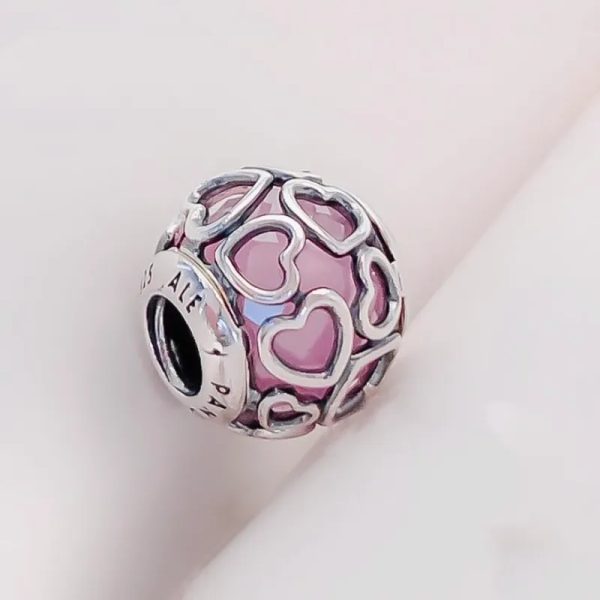 Charm corazones cristal rosa