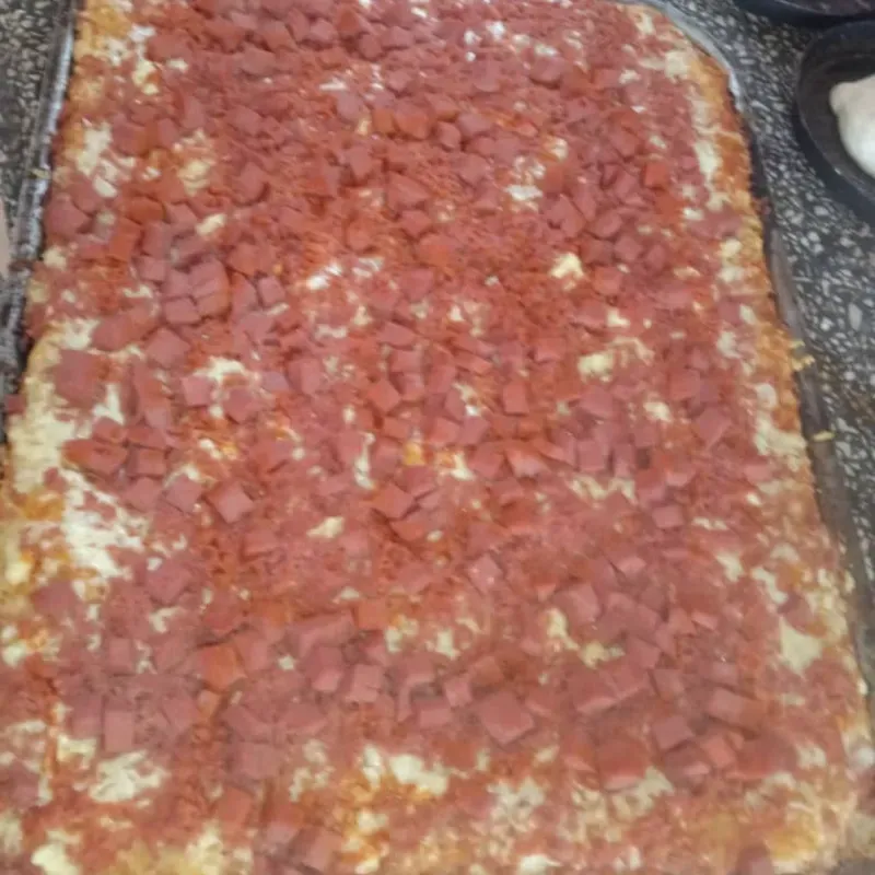 Pizza familiar jamón o salchicha