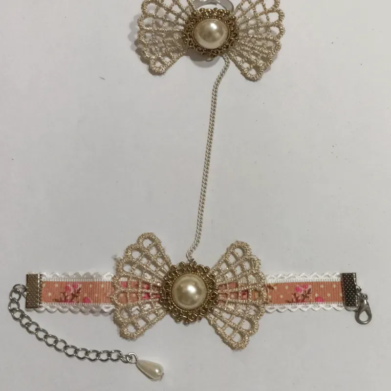 Pulso con anillo de perla y lazo