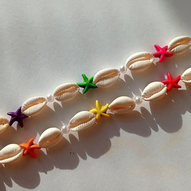 Pulsera de caracoles y estrellas