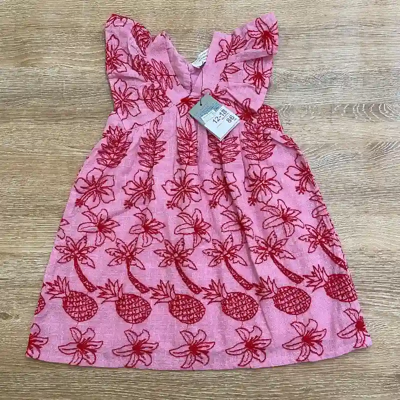 Vestido color rosado con bordados rojos