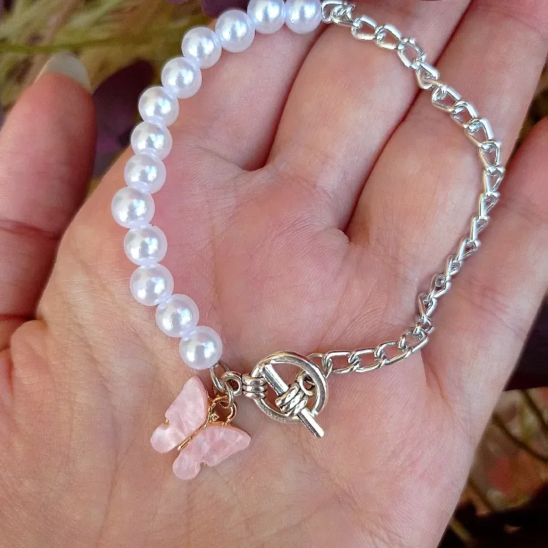 Pulsera de perlas y cadena