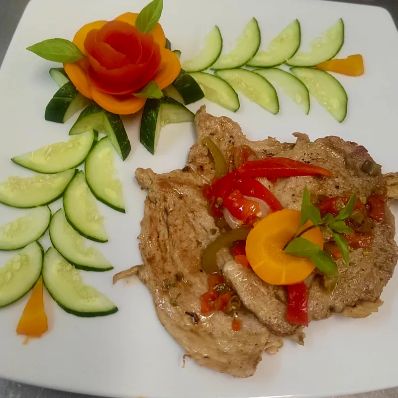 Bistec de cerdo grillé