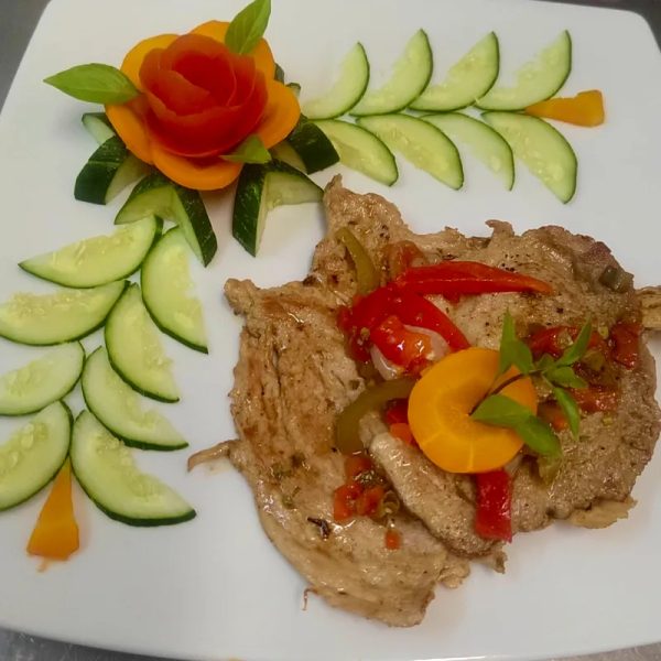 Bistec de cerdo grillé
