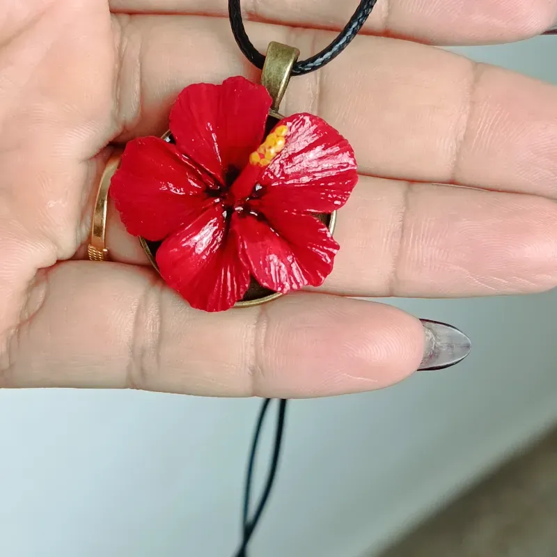 Dije marpacifico Rojo