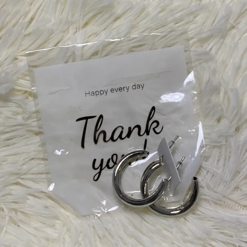 Aretes plateados, modelo #4. 