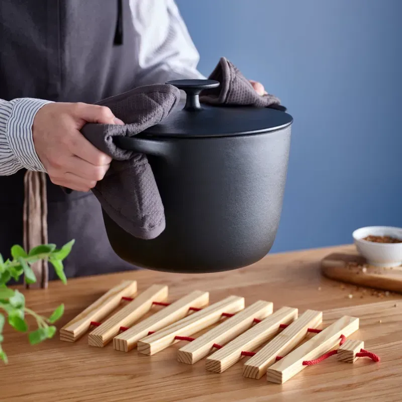 Salvamanteles extensible de madera