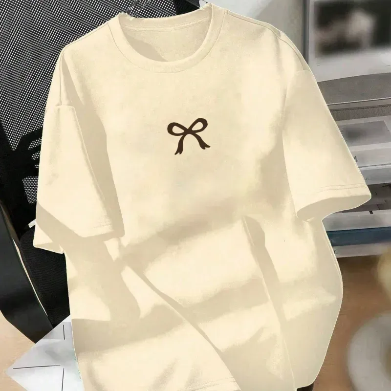 Pullover beige con lacito