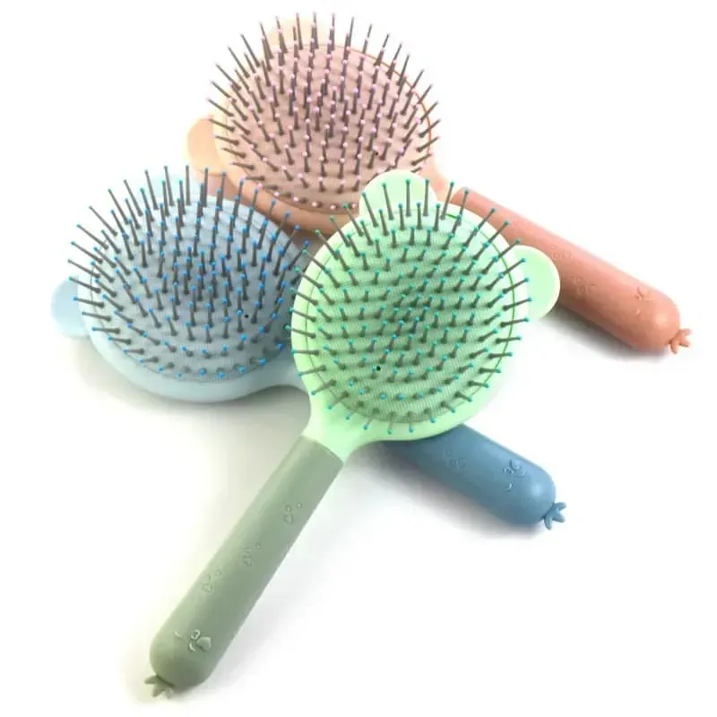 Cepillo para peinar con orejitas