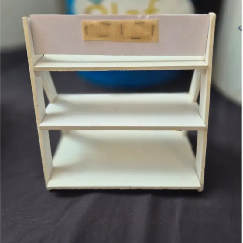 Expositor (de tres niveles, de forma rectangular).