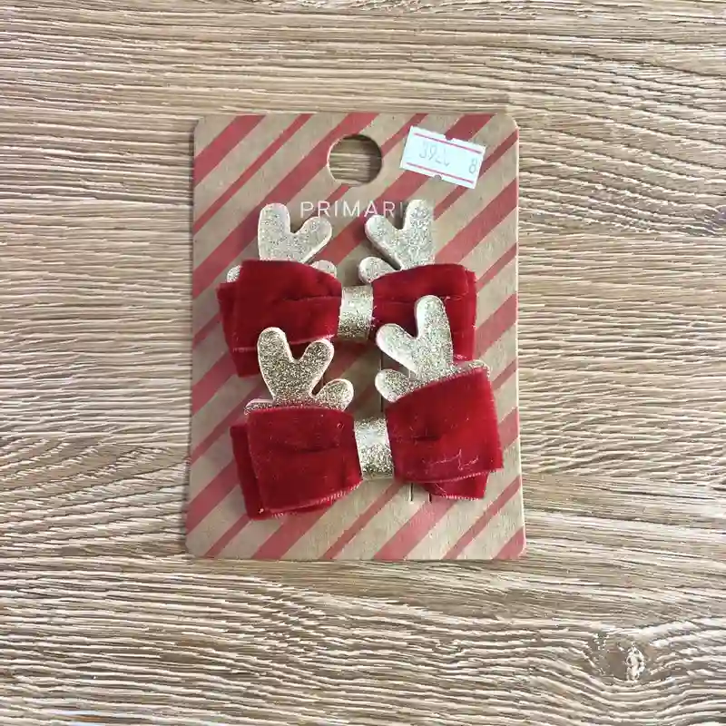 Hebillas con lazos y cuernitos