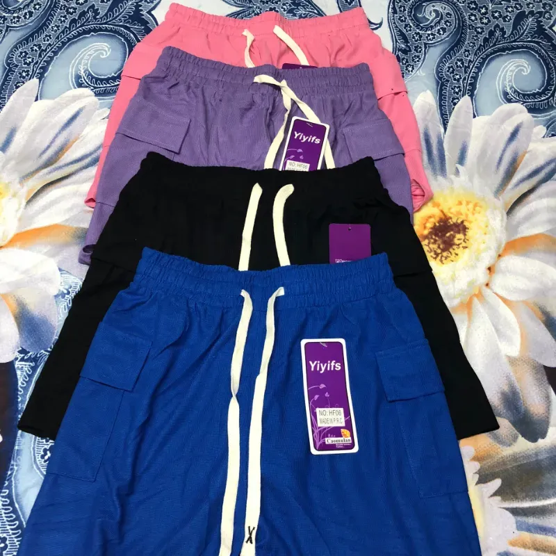 Shores de mujer con bolsillos laterales.( Moda)