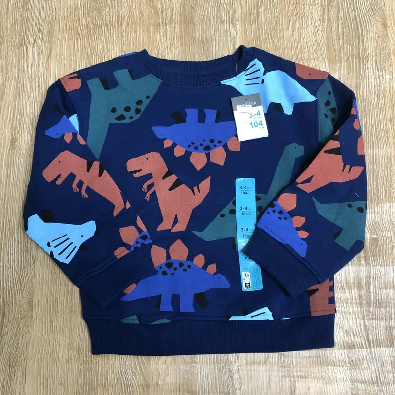 Abrigo azul oscuro con dinosaurios