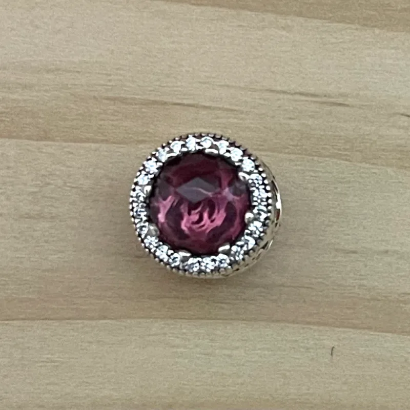 Charm de piedra rosada