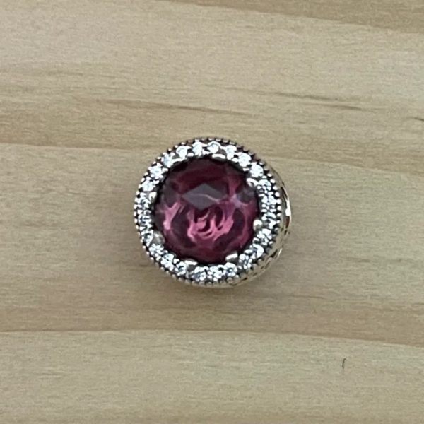 Charm de piedra rosada