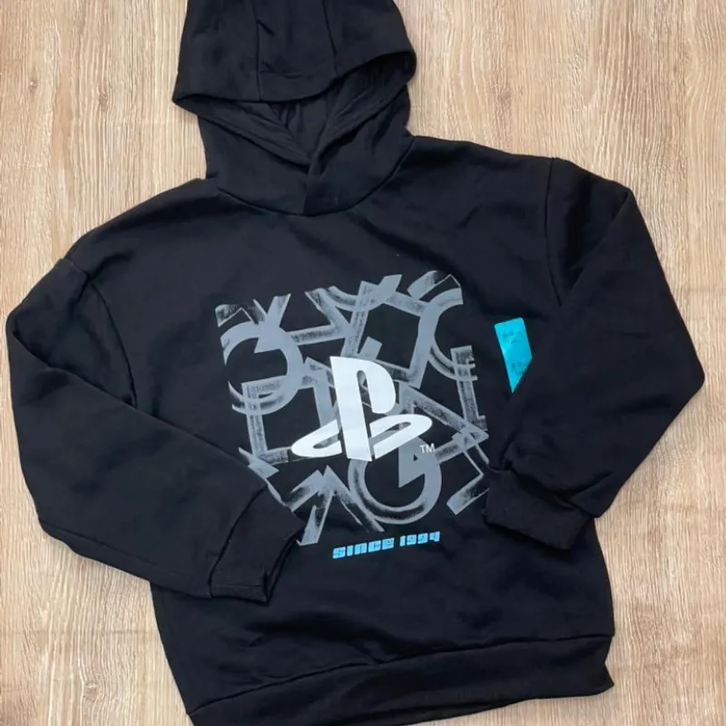 Abrigo de Play Station color negro