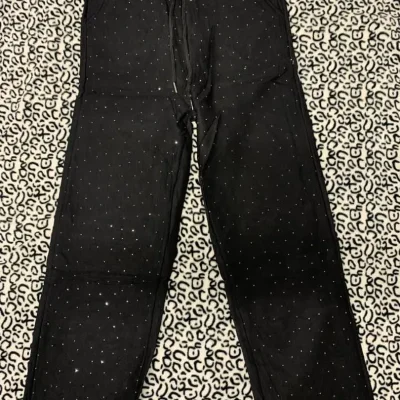Pantalón estilo mono d algodón x dentro con brillo.