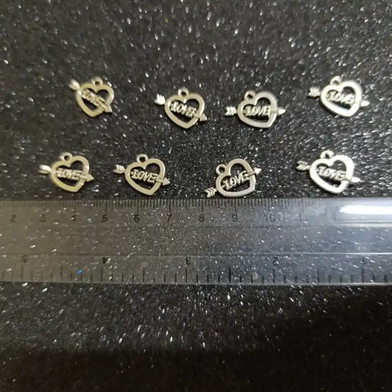 Dije de corazón con flecha 