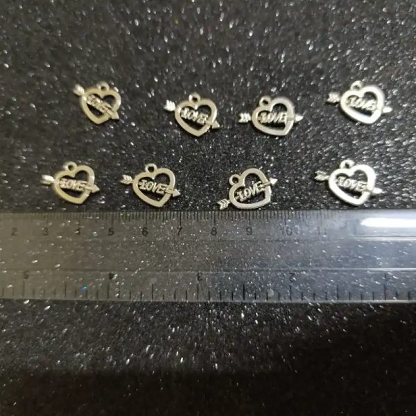 Dije de corazón con flecha 