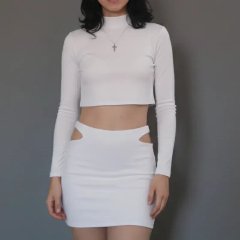 Conjunto elastizado de suéter y falda con aberturas en las caderas