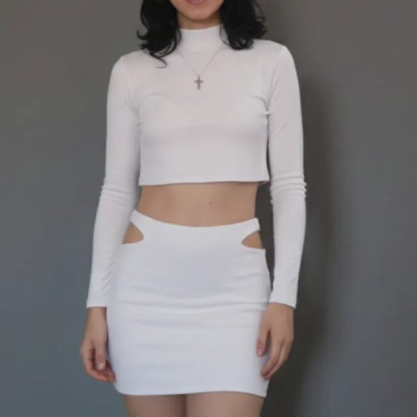 Conjunto elastizado de suéter y falda con aberturas en las caderas