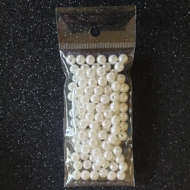 Perlas plásticas de 6mm blancas marfil