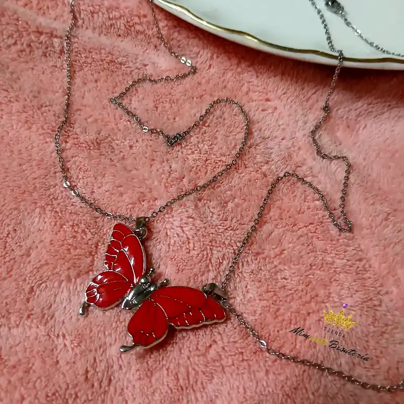 Juego cadenas de acero inoxidable con dije mariposa imantado
