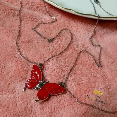 Juego cadenas de acero inoxidable con dije mariposa imantado