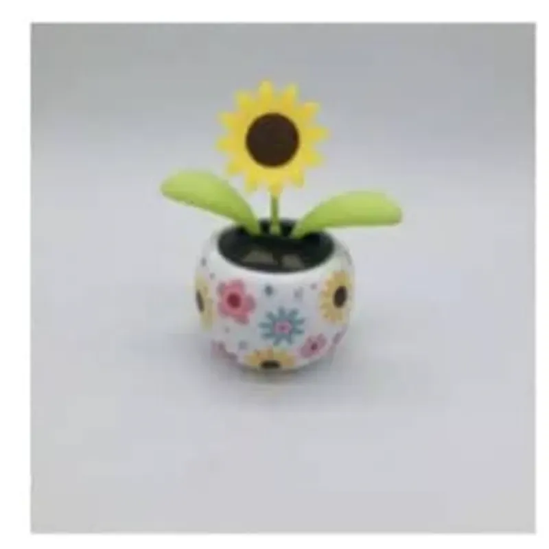 ADORNO DE FLOR CON PANEL SOLAR PARA AUTOS