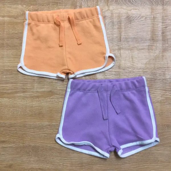 Short deportivos color naranja y morado