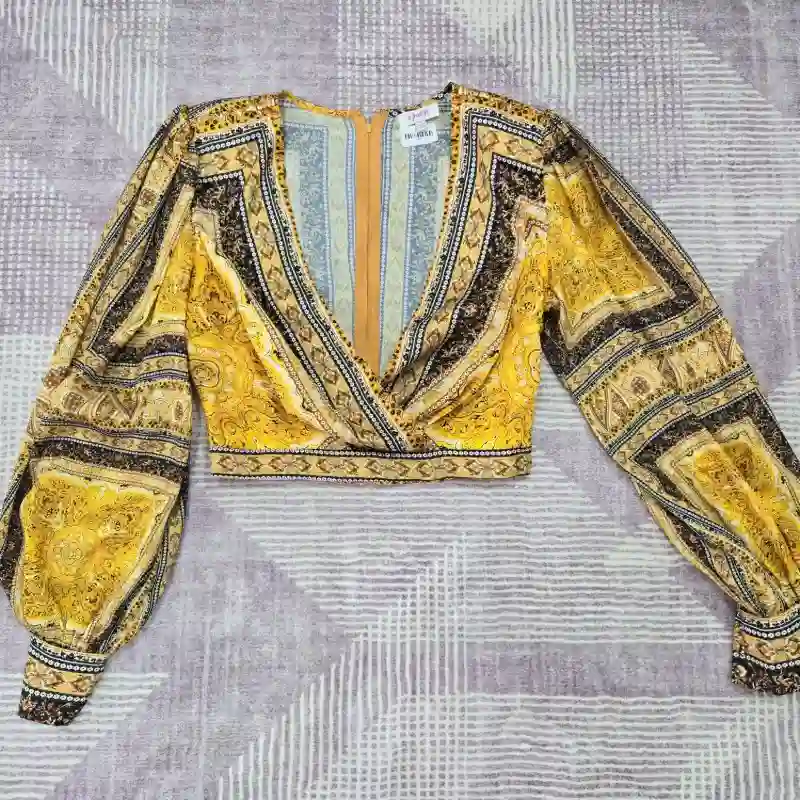 Blusa estampada amarilla mangas largas