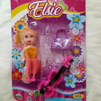 Juguete Barbie con violín  y bolso 