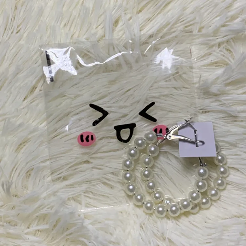 Aretes plateados, modelo #3. 