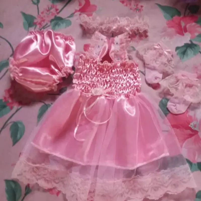 Bata de elástico con sobrevuelo