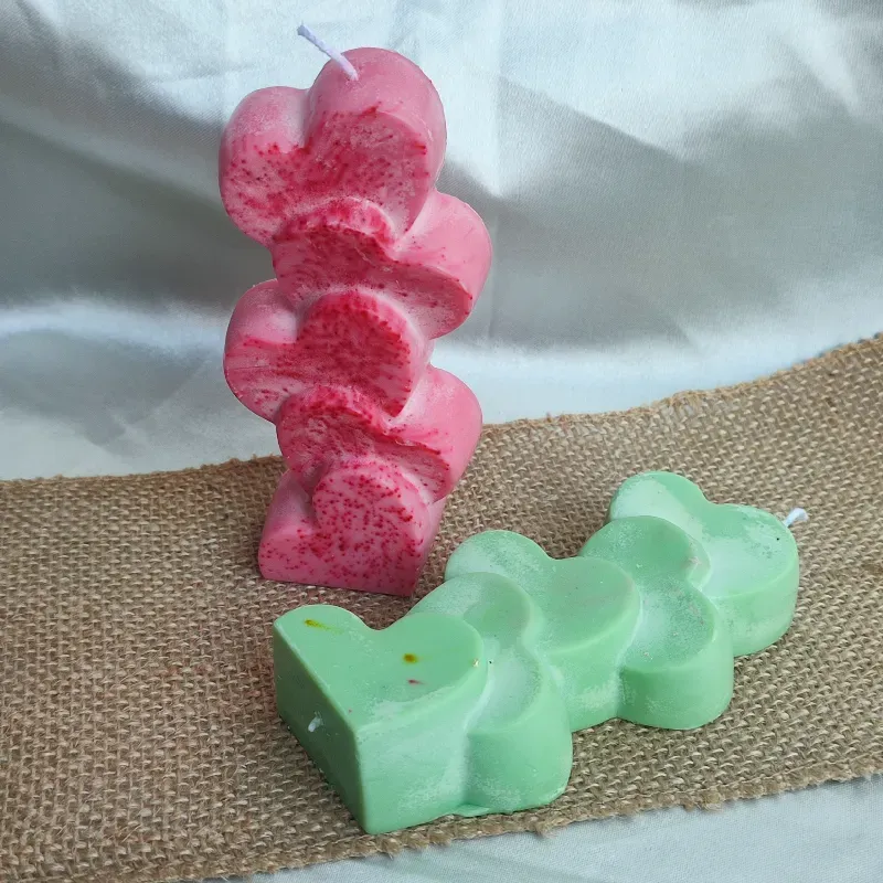 Corazones unidos de cera