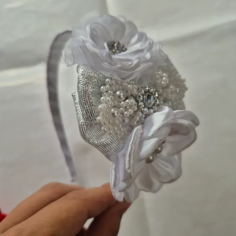 Cintillo con lazo de perla