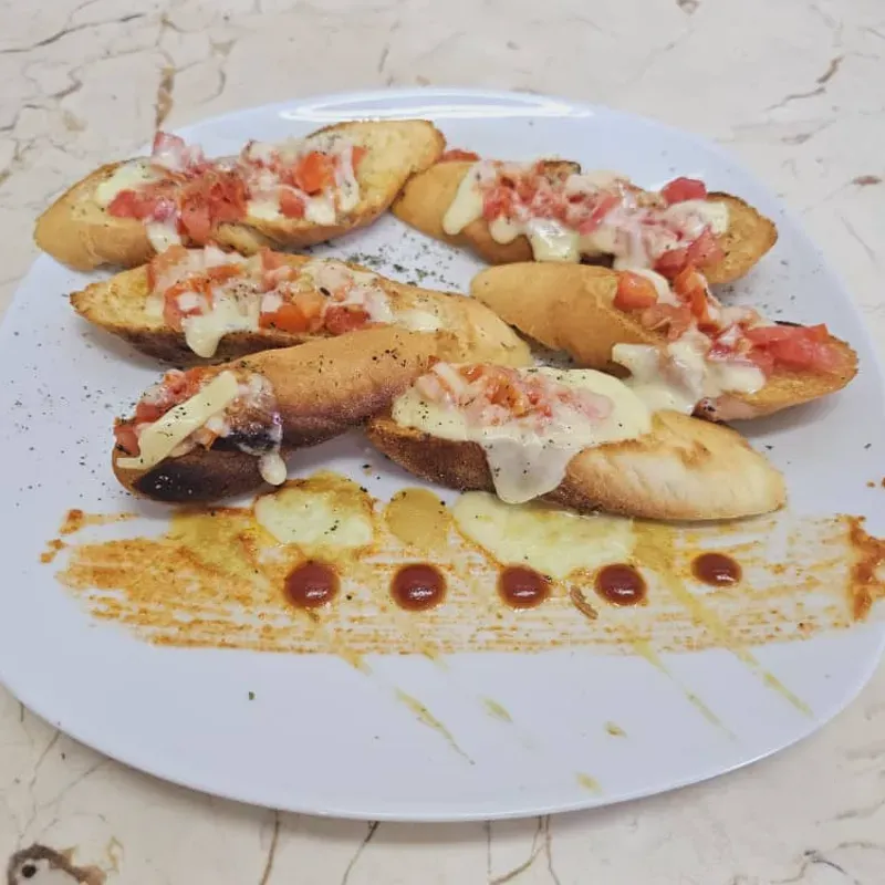 Brusqueta de tomate y queso