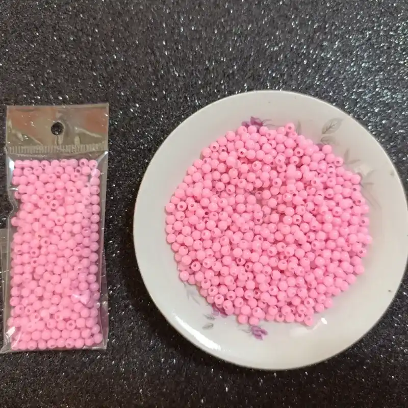 Perlas plásticas redondas de 4mm rosadas