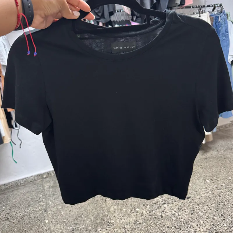 Pullover negro lefties