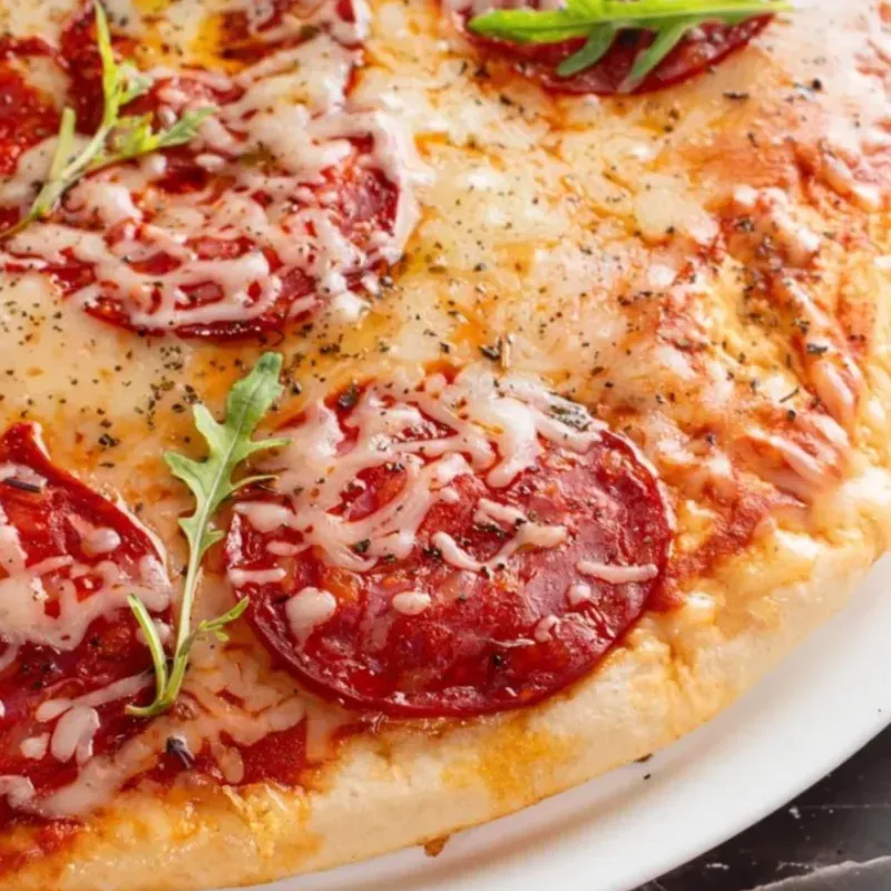 Pizza de chorizo vela