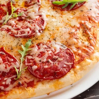 Pizza de chorizo vela