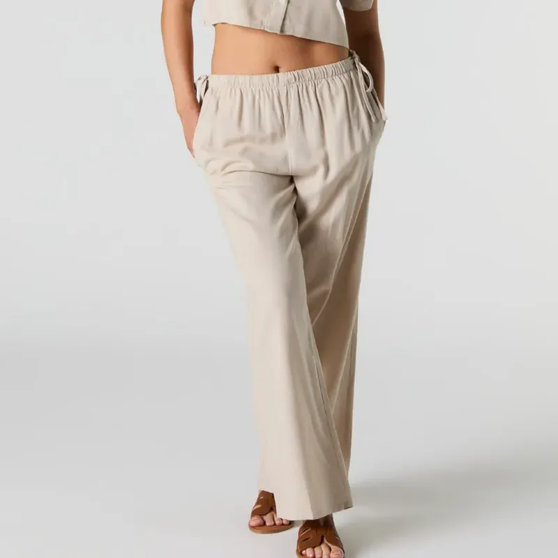 Pantalon beige.