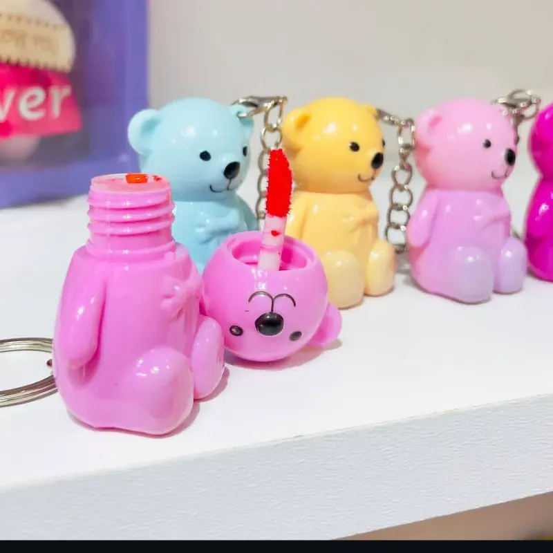 Llaveros de oso y brillo