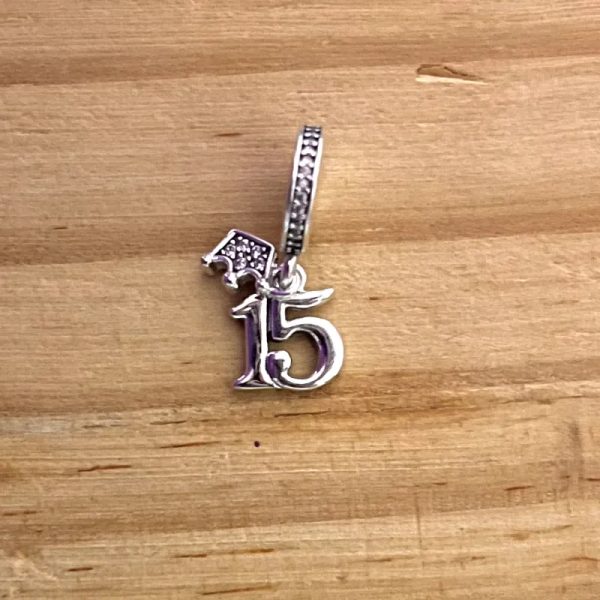 Charm 15 años
