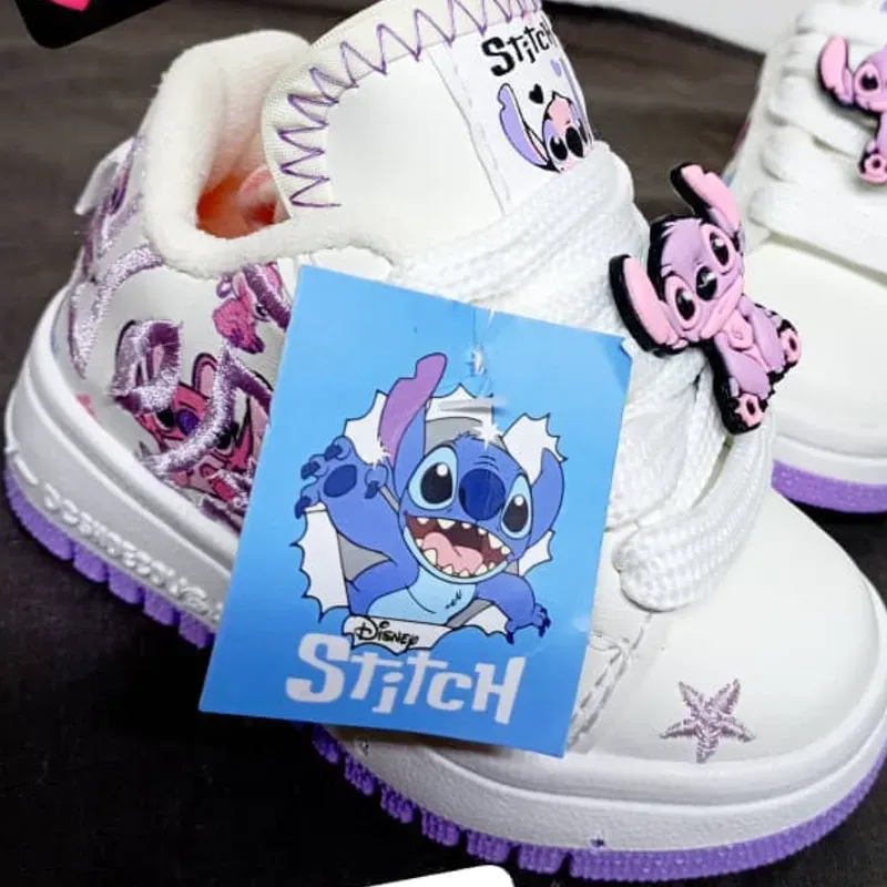 DOLCE & GABBANA STITCH ANGEL SUELA MORADA  Alumbran